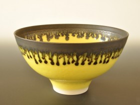 Yellow and bronze bowl 13cm diameter.